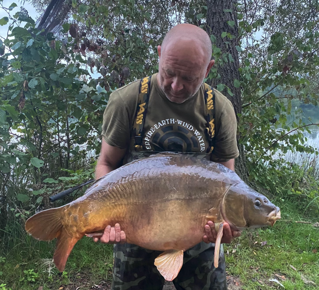 Large Carp caught with Prime Baits Bait primed and ready bait for fishing in UK lakes in England located in Devon Plymouth